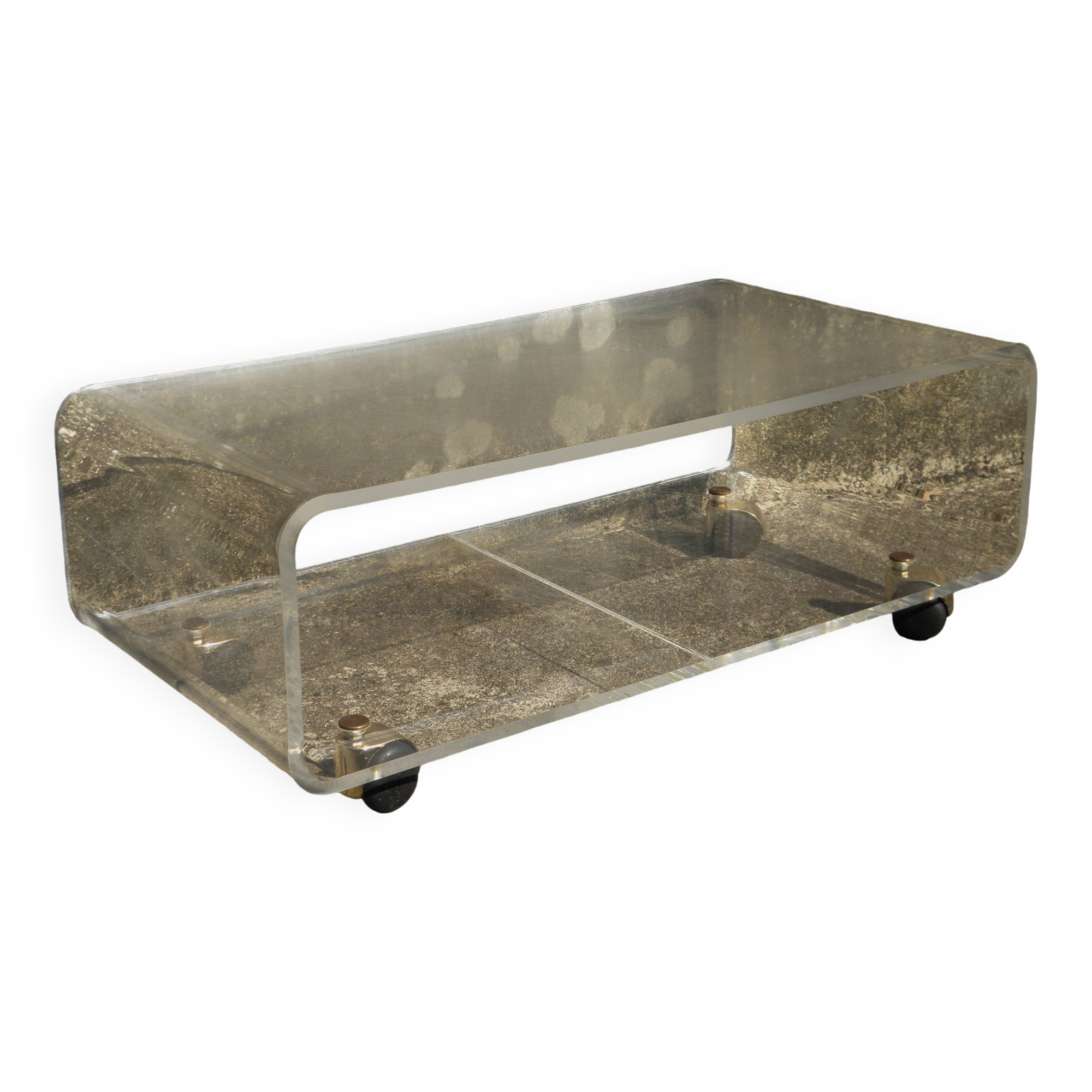 Plexiglass coffee table on wheels