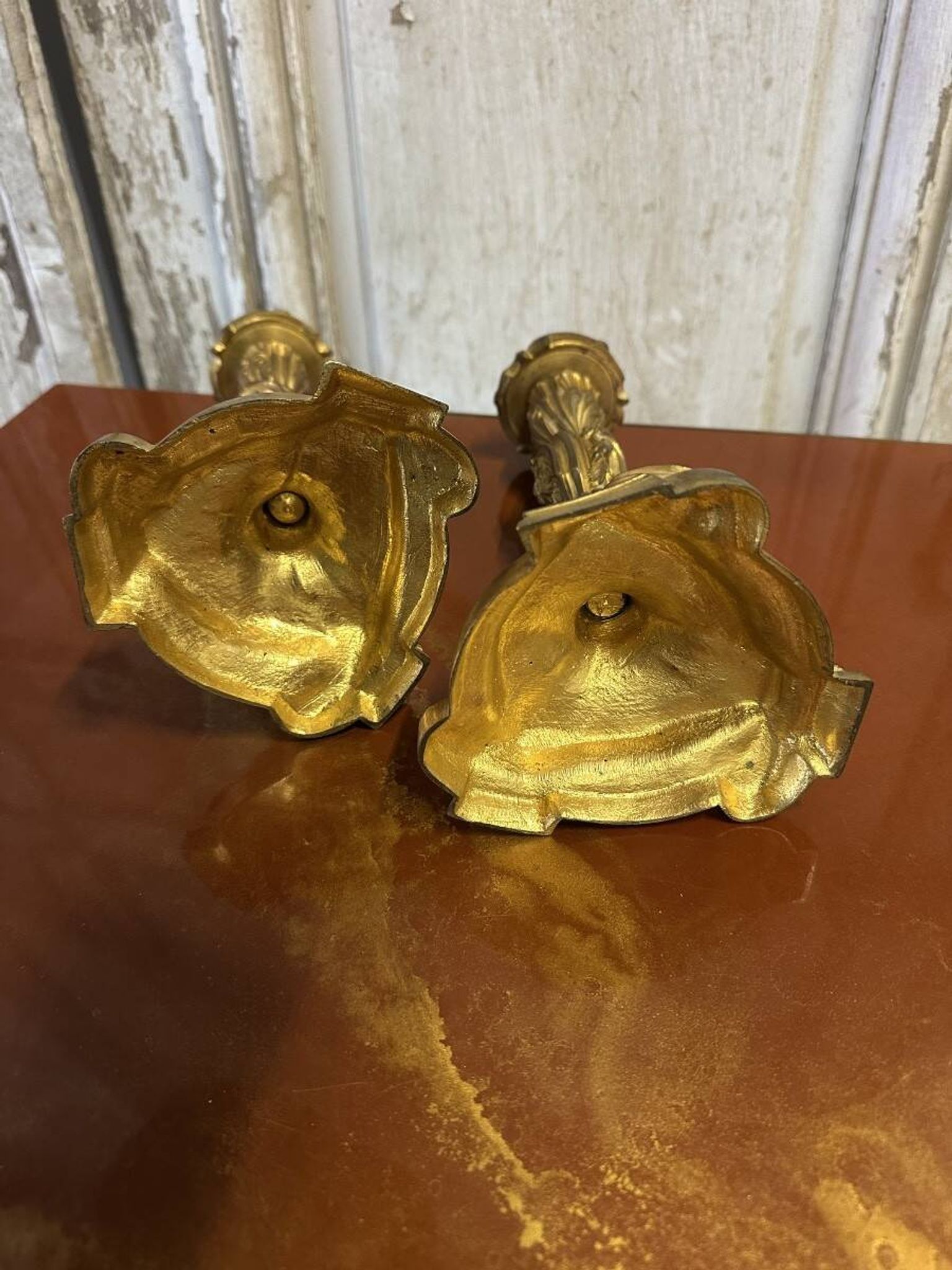 Pair of bronze candlesticks from the early 20th century in Louis XV style.