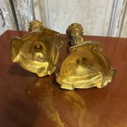Pair of bronze candlesticks from the early 20th century in Louis XV style.