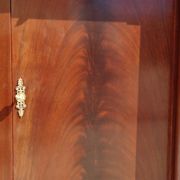 Flamed mahogany enfilade with sea green marble in Empire style.