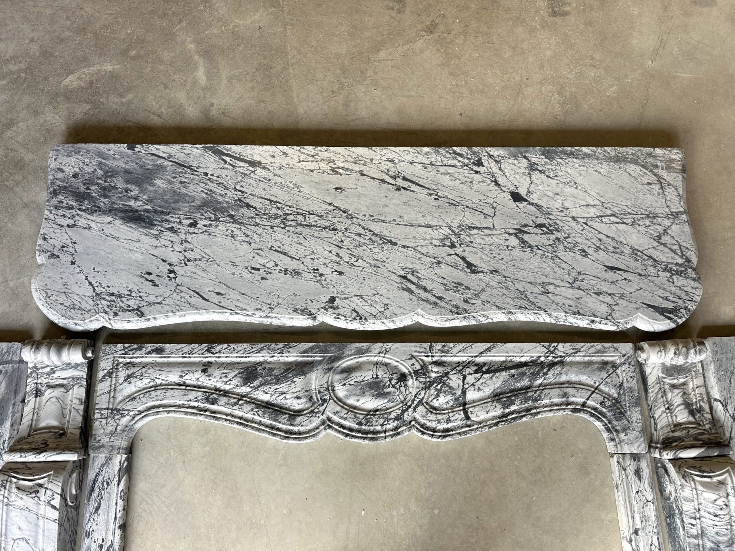 Pompadour fireplace in Louis XV style from around 1880 in blue floral marble.