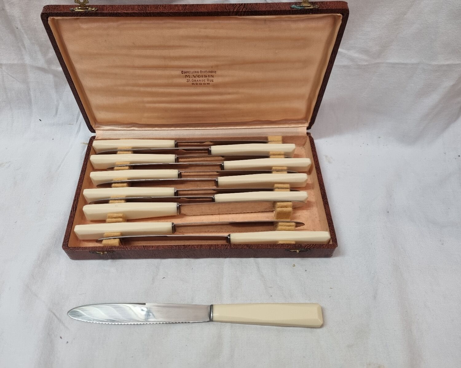 12 ivory Bakelite meat knives