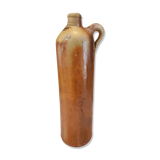 Old bottle in terracotta varnished finish