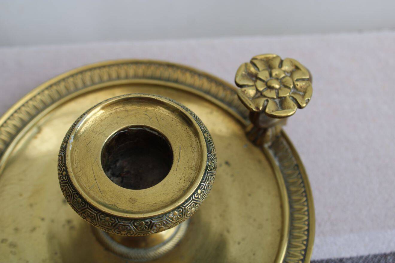 Golden brass candle holder