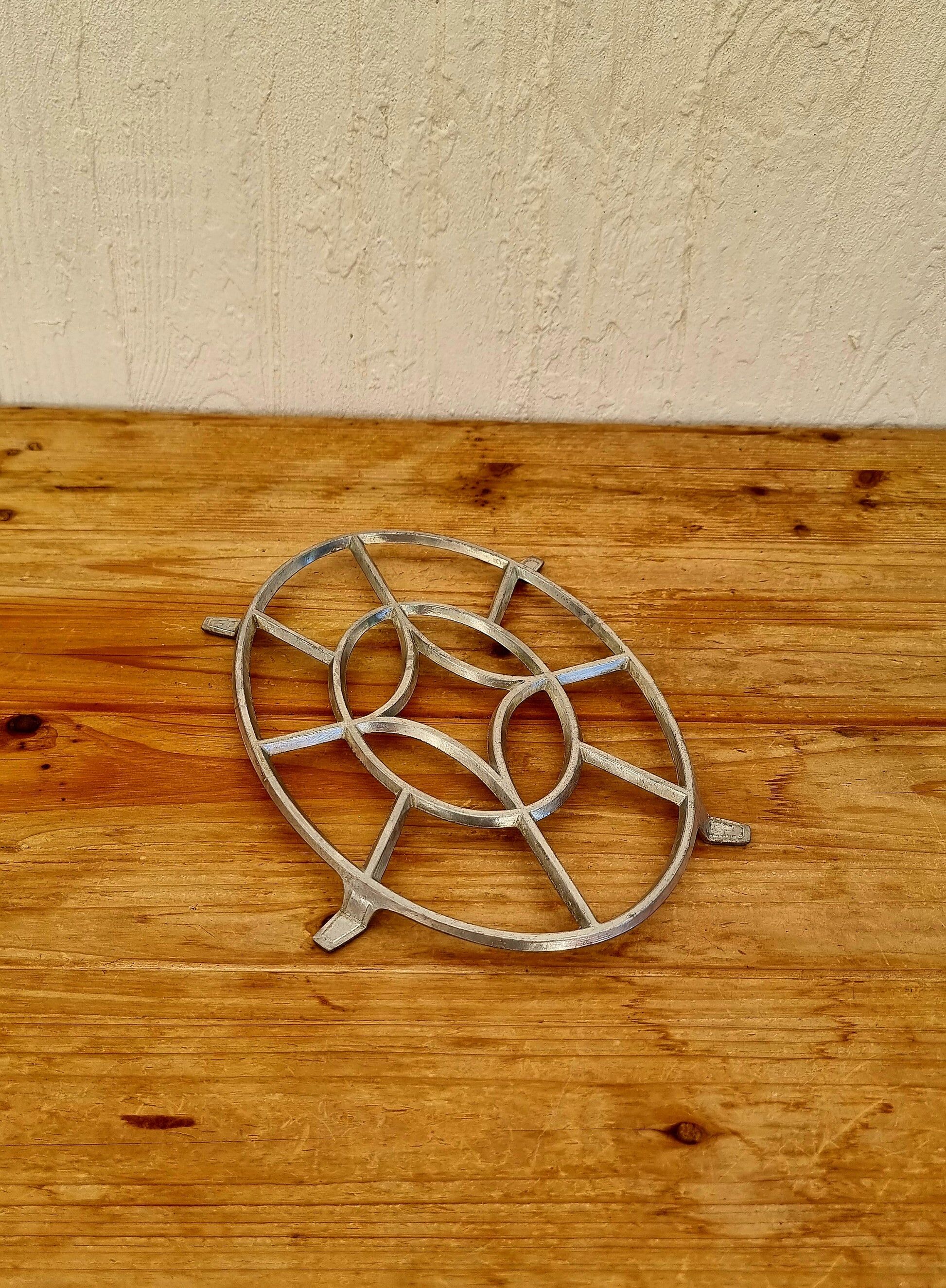 Vintage aluminium trivet