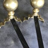 Paire de chenets en laiton et fonte, décor de marmousets, style louis xiv