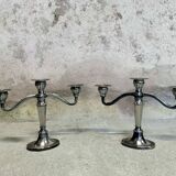 Pair of 2-branch metal candlesticks.