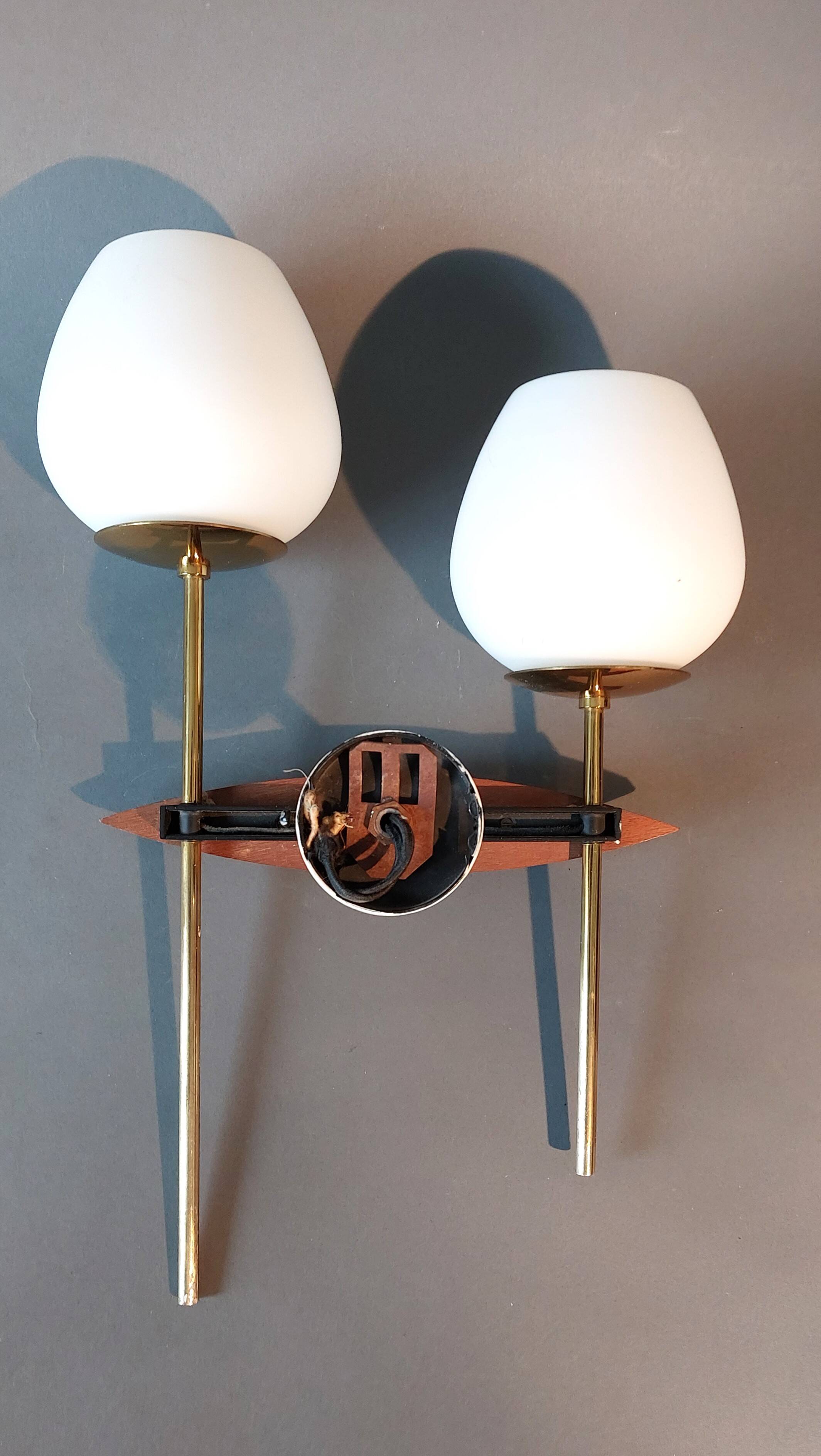 Two-light wall lamp in teak, gilded brass and white opaline Maison Lunel 1960.