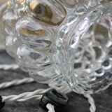 Moulded glass globe hand lamp