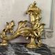 Paire de chenêts en bronze ciselé et doré d'après un modèle de Jacques Caffieri, Paris XIXème