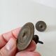 Pair of antique Empire furniture knobs from the 19th century.