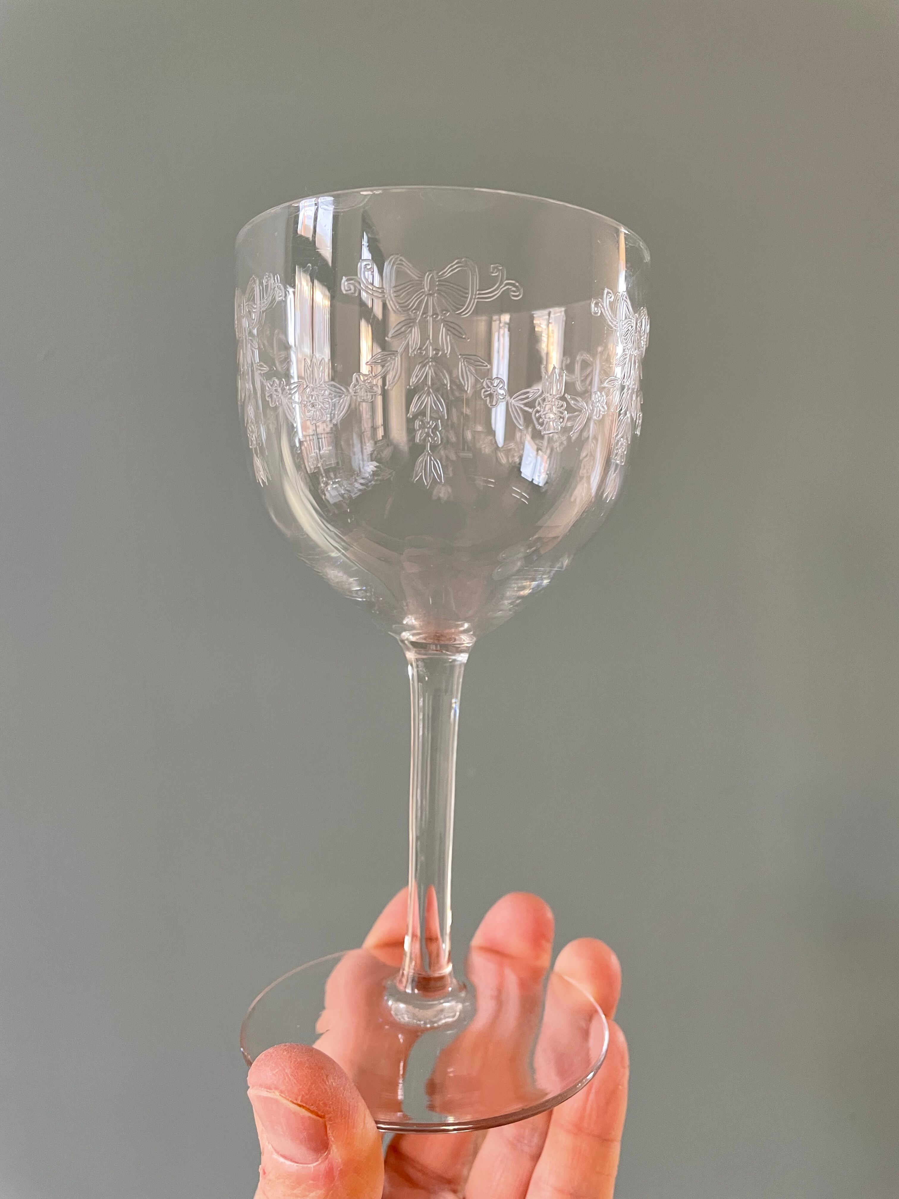 Set of 4 antique chiseled crystal foot glasses