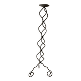 candlestick on wrought iron feet