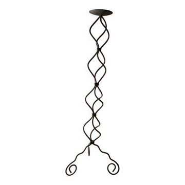 candlestick on wrought iron feet