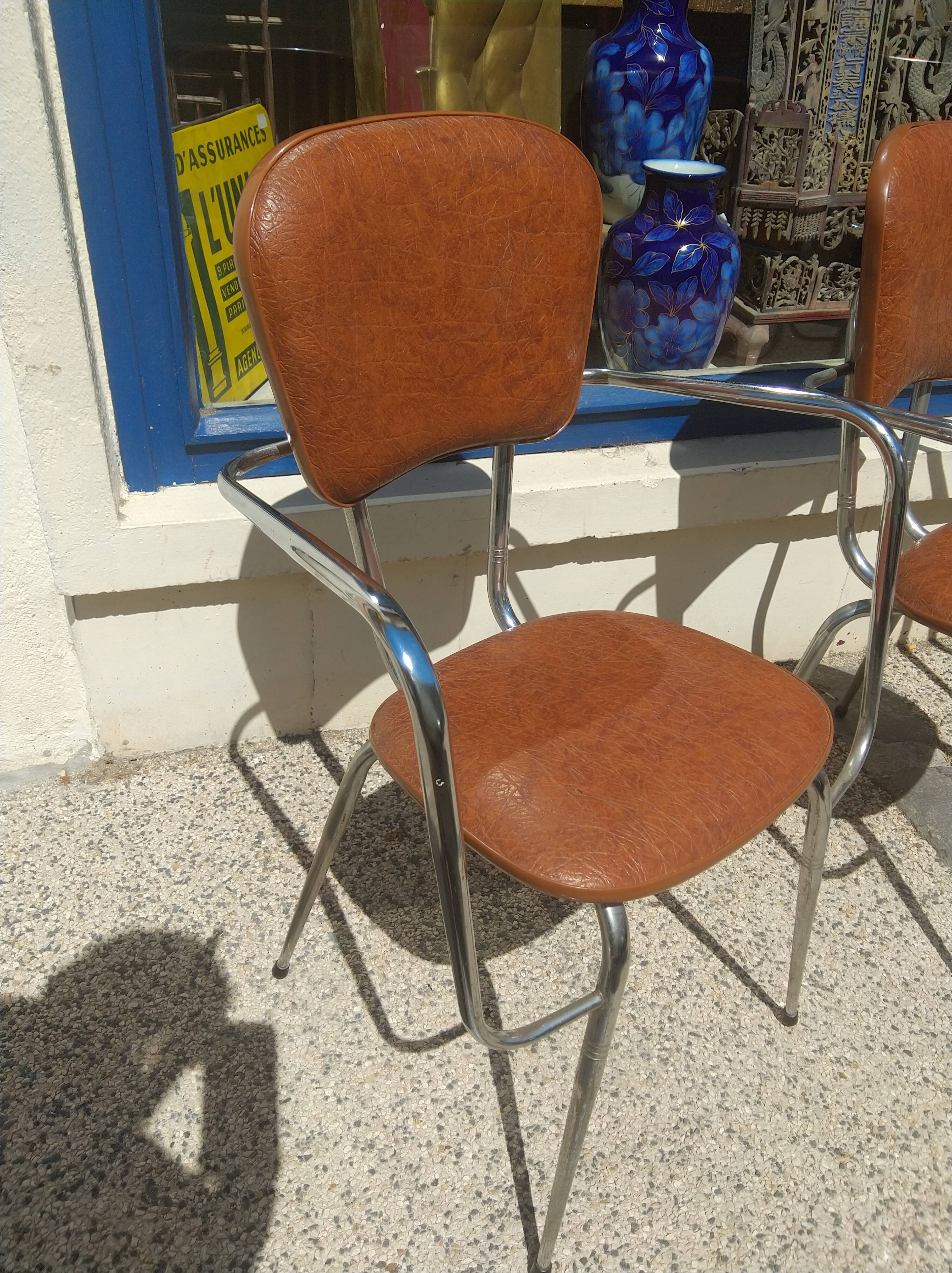 Set of 4 armchairs in chromed metal and brown imitation leather, circa 1960