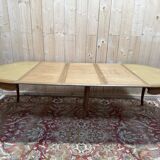 Round oak dining table with leather in Louis XV style.