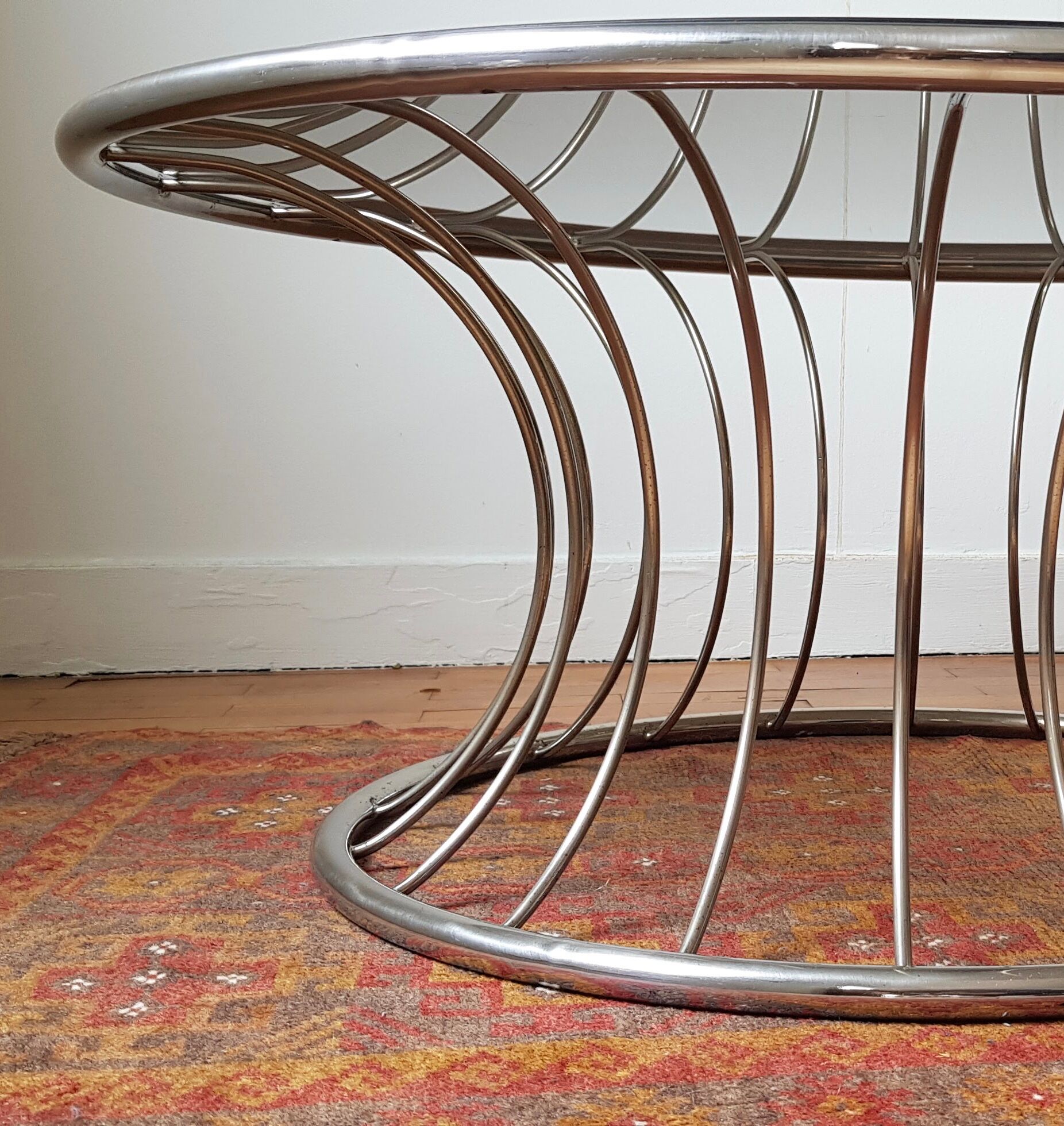 Chromium round coffee table and smoked glass