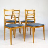 Set of four blue velvet Scandinavian chairs.