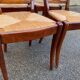 4 Landais chairs with solid oak cross frames, straw seats.