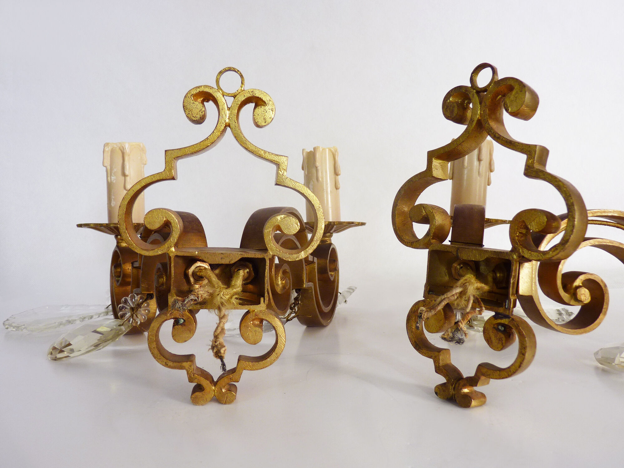 Former pair bronze wall sconces with double lights and tassels. Art Deco period