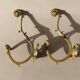 Paire de patères en bronze doré de style Louis XVI, XIXéme siècle.