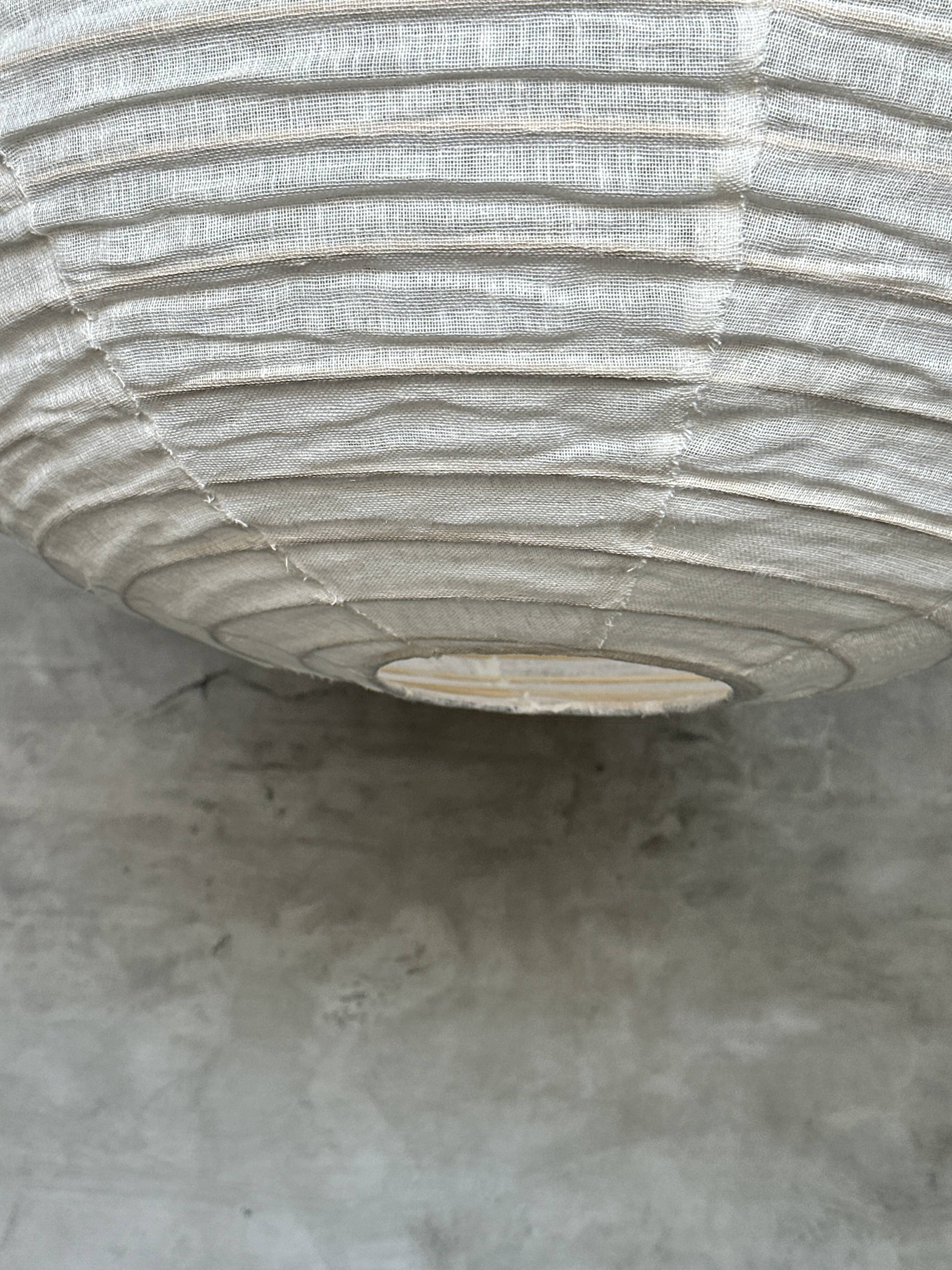 Very large Japanese-style natural rattan and linen pendant light in the shape of a drop H65 D70