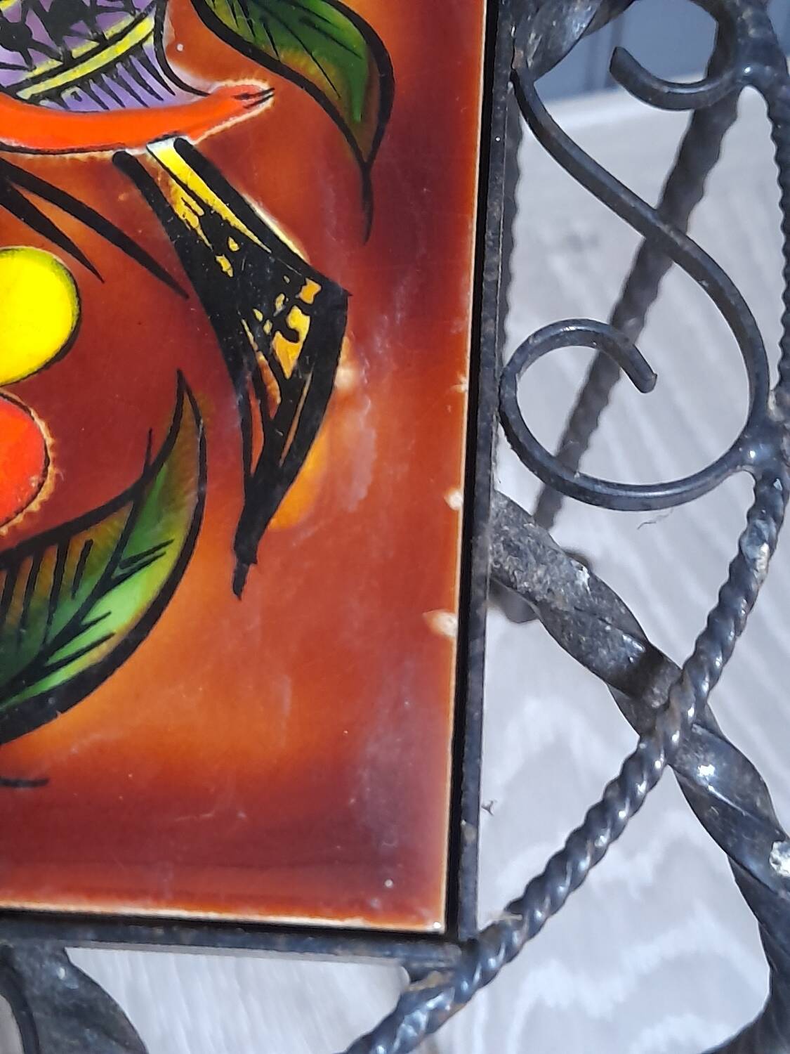 Wrought iron stool and Vallauris pottery signed Leduc.