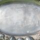Service tray made of cast aluminium with vegetable decoration