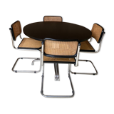 1 Dining table and its 8 chairs in canelet year 70