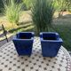 Set of two hanging pots in blue glazed ceramic.