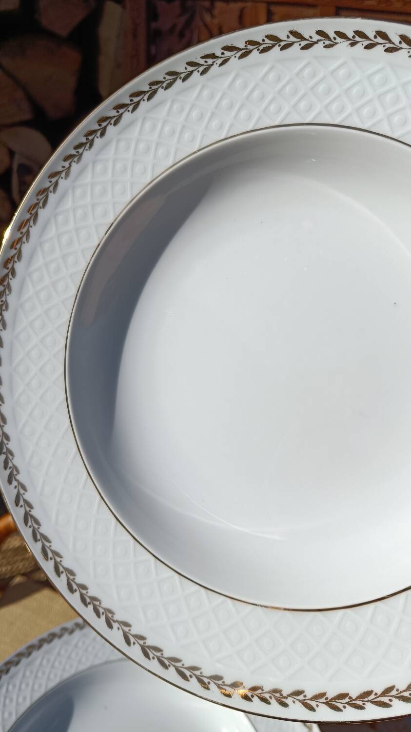 Twelve white porcelain plates
