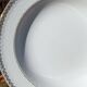 Twelve white porcelain plates