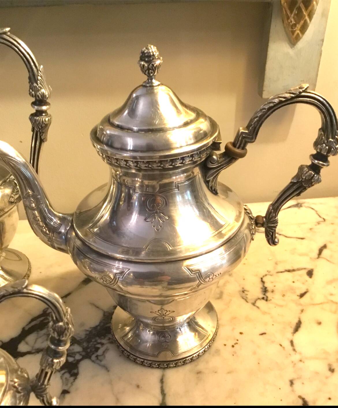 Silver-plated metal tea and coffee service in a 4-piece style.