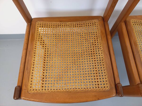 Paire de chaises traîneau vintage en bois de hêtre et cannage des années 70