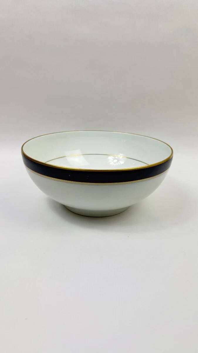 45-piece table service in Limoges porcelain by Chastagner, blue and gold.