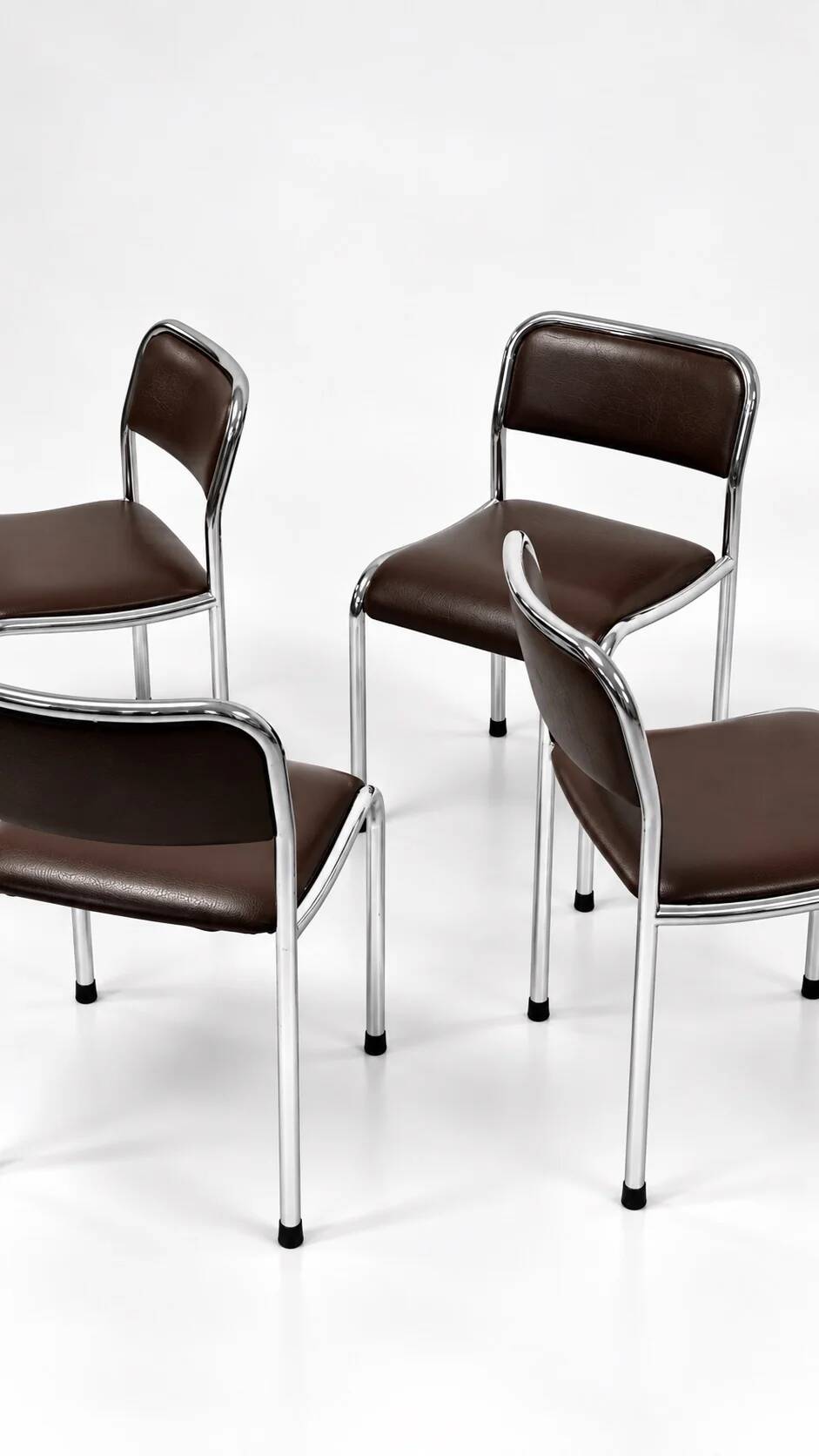Set of 4 vintage dining chairs in chrome, brown faux leather, 1970s.