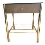 Golden bedside table with mirrored top