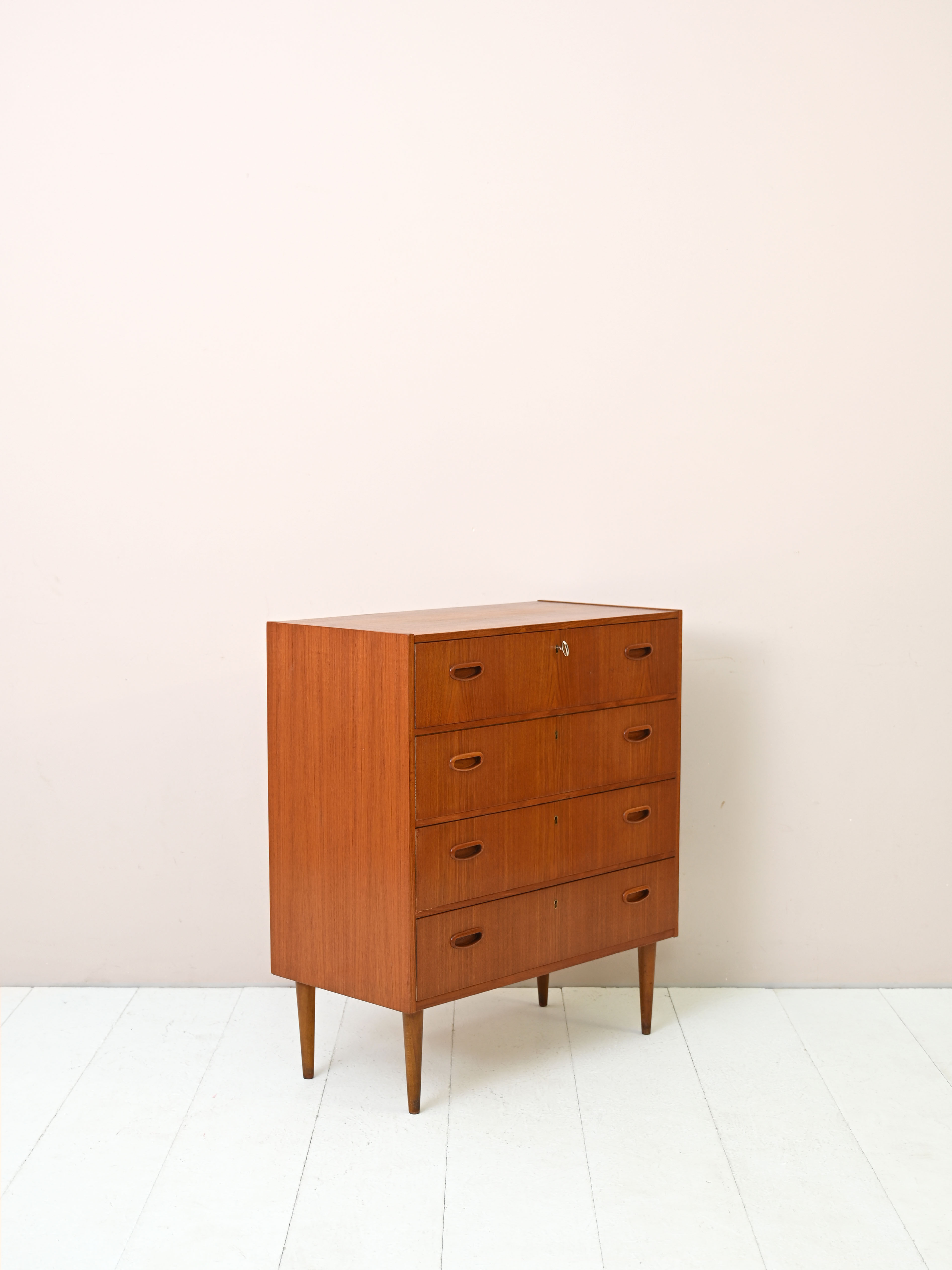 Modern antique chest of drawers with four drawers