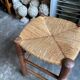 Tabouret en paille tressée et bois