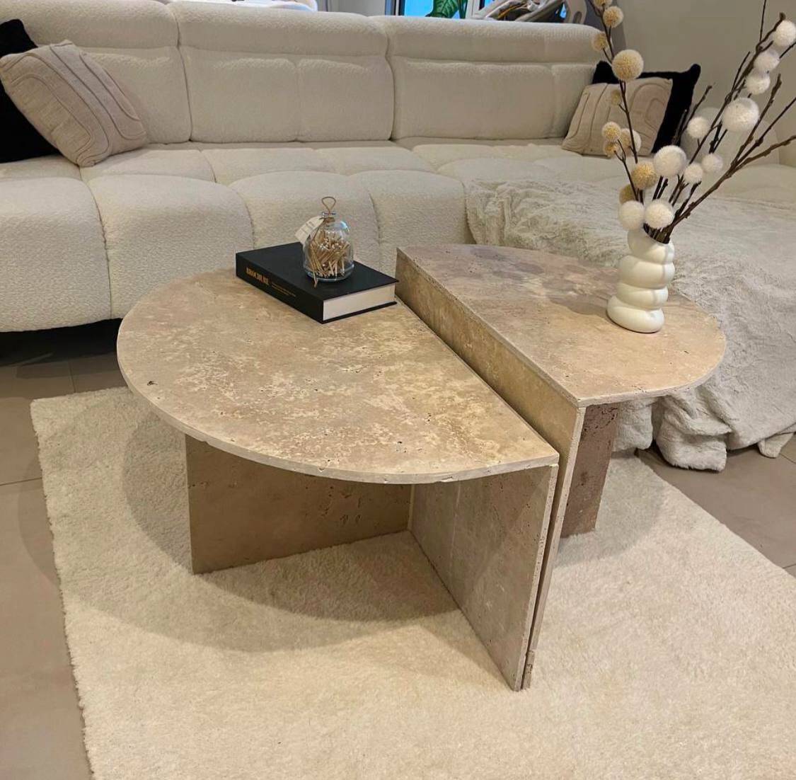 Half-moon travertine coffee table