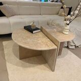 Half-moon travertine coffee table