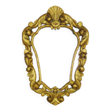 Old wall mirror in wood and gilded stucco with shell decoration, Louis XV style pediment mirror