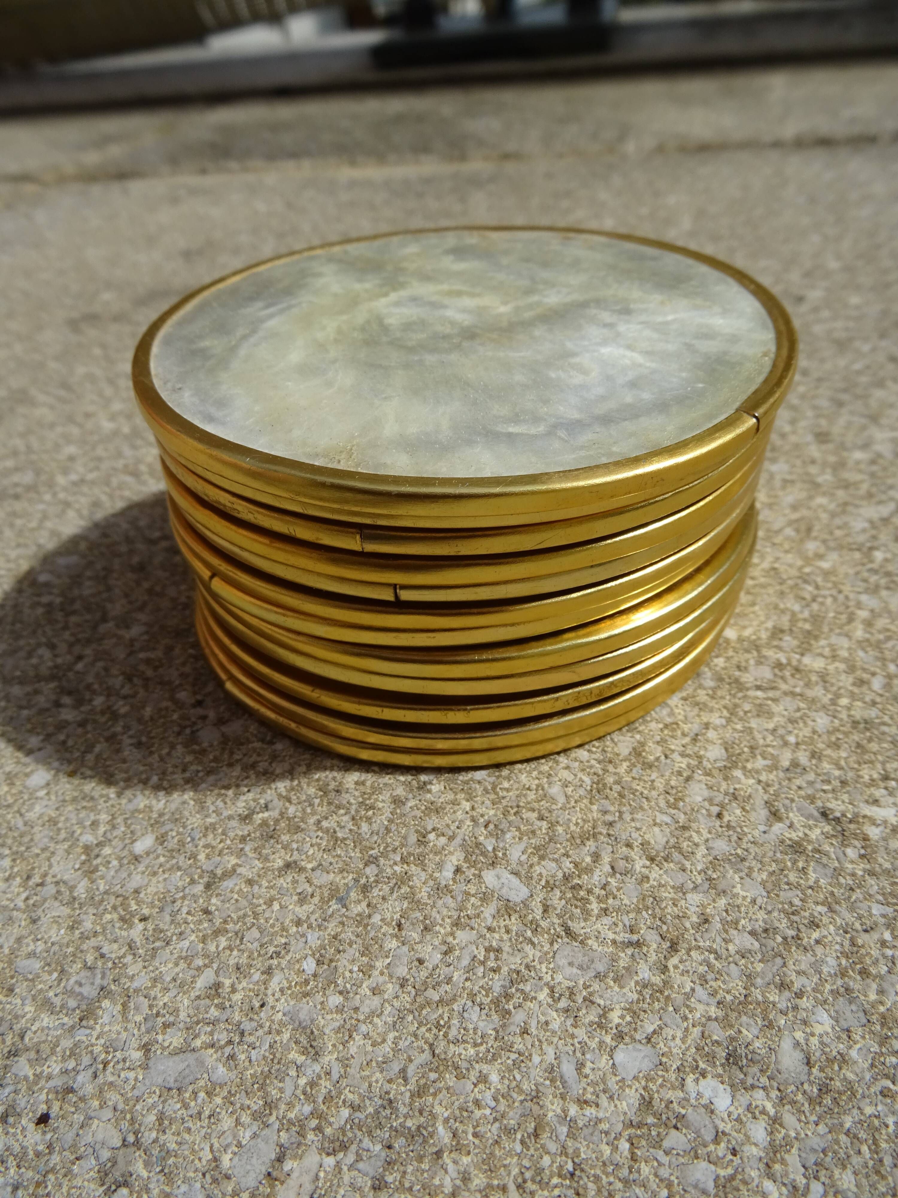 Series of 12 vintage mother-of-pearl coasters