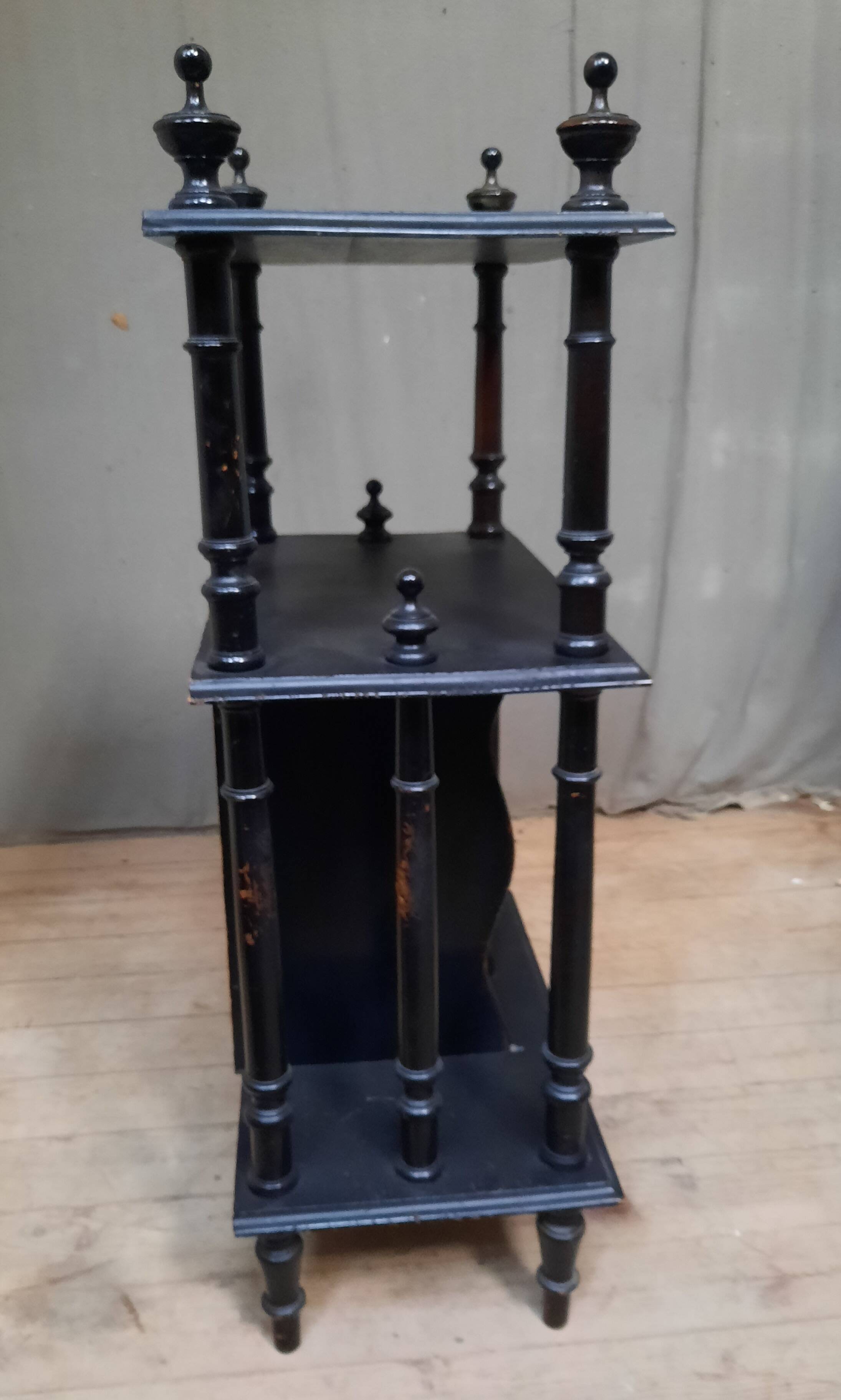 Blackened wooden shelf