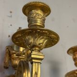Pair of Louis XVI style wall sconces in gilded bronze, circa 1880.