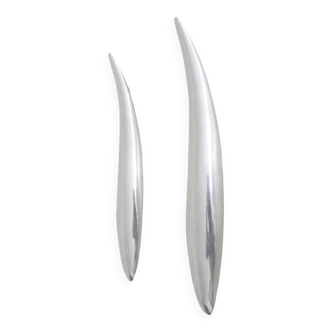 Pair of designer wall sconces in aluminium in the style of Lucien Gau.