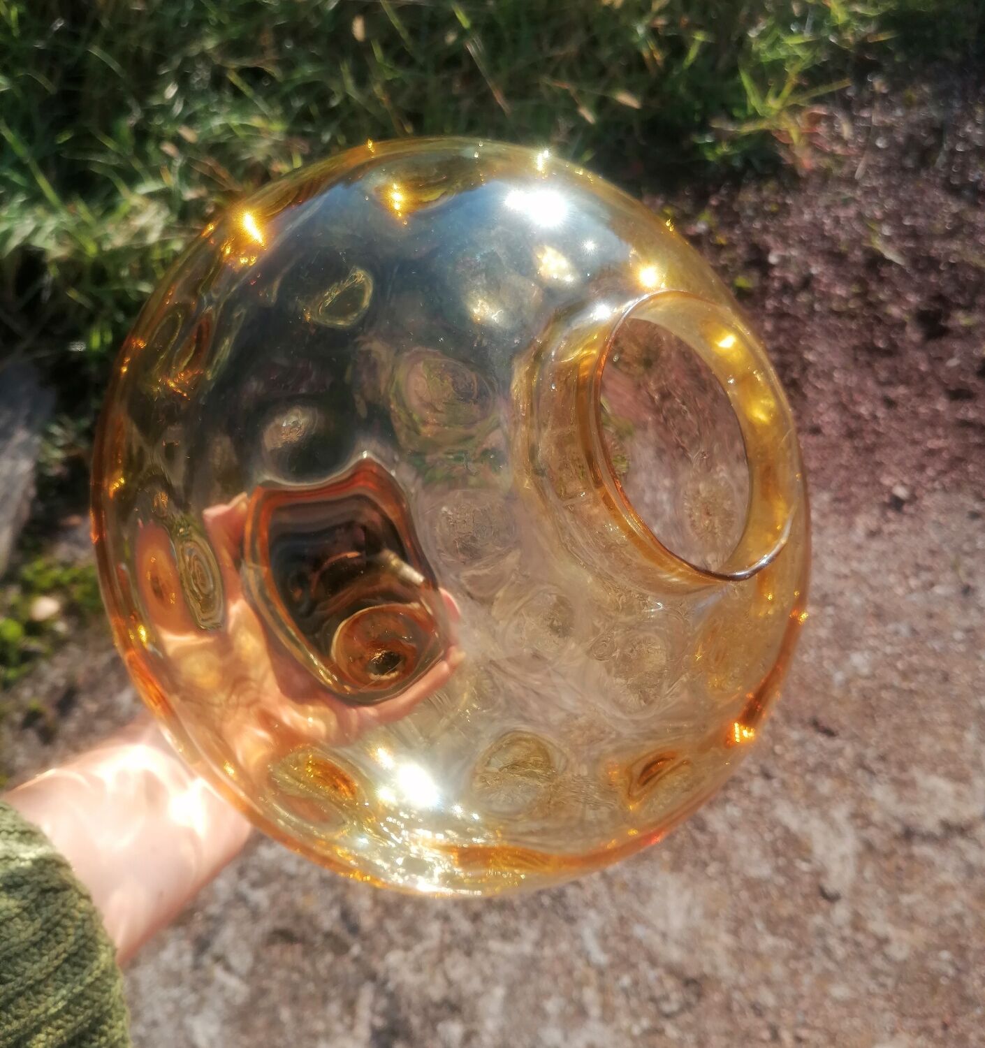 Vintage suspension ball in amber glass