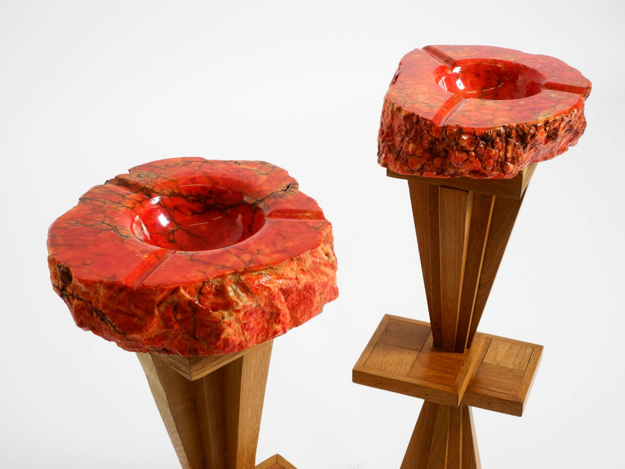 Two mid-century standing ashtrays consisting of red Alabaster cup