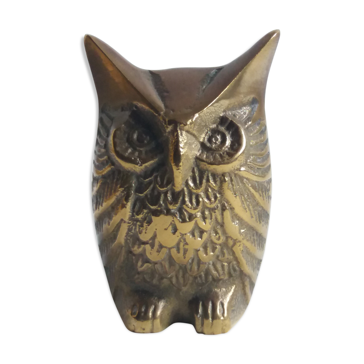 Chiseled brass owl