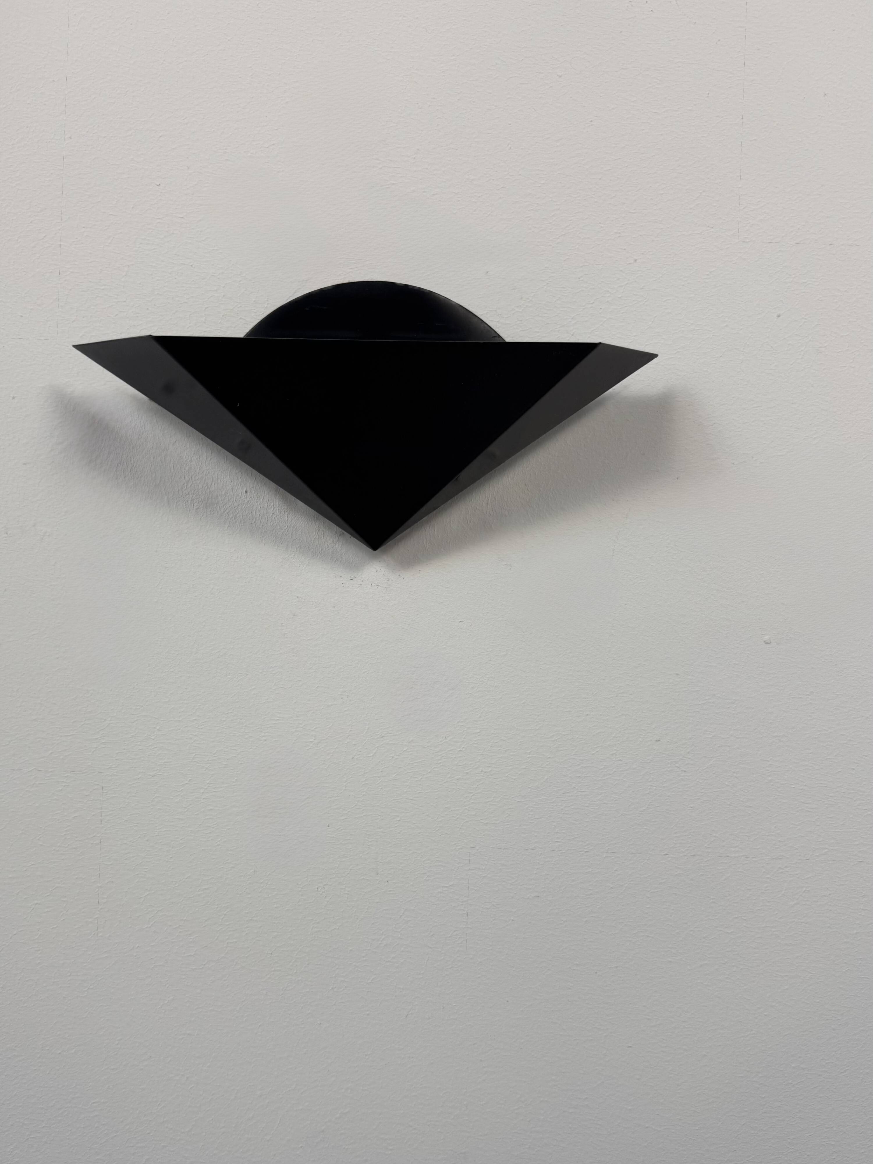 Pair of vintage wall sconces, matte black metal, France, 1970.